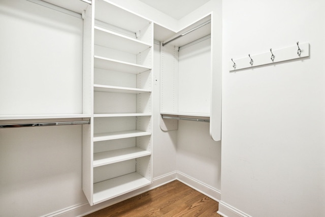1726 W Huron St, Chicago, IL 60622 - walk in closet with wood finished floors