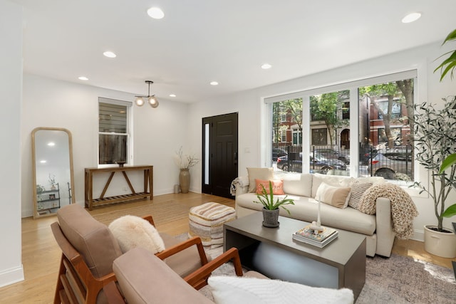 1726 W Huron St, Chicago, IL 60622 - living room with light wood-style floors and recessed lighting