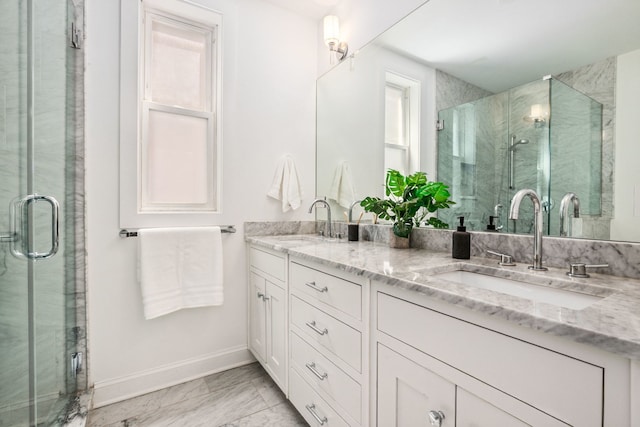 1726 W Huron St, Chicago, IL 60622 - bathroom featuring double vanity, marble look tile flooring, and a marble finish shower
