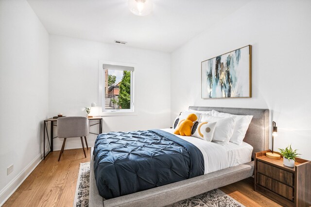 1726 W Huron St, Chicago, IL 60622 - bedroom with wood finished floors and baseboards
