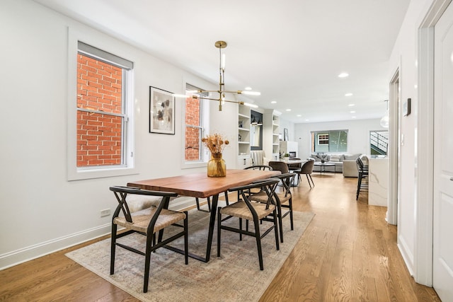 1726 W Huron St, Chicago, IL 60622 - dining area featuring light wood-style flooring, recessed lighting, and a chandelier