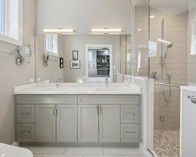 4115 N Lincoln Ave Unit 4N, Chicago, IL 60618 - bathroom with a shower stall, double vanity, and tile patterned floors