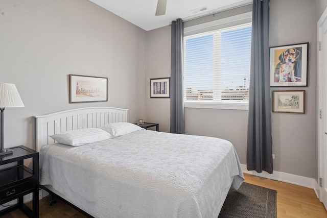 4115 N Lincoln Ave Unit 4N, Chicago, IL 60618 - bedroom featuring wood finished floors and a ceiling fan