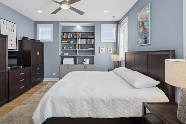 4115 N Lincoln Ave Unit 4N, Chicago, IL 60618 - bedroom featuring light wood-style flooring, ceiling fan, and recessed lighting