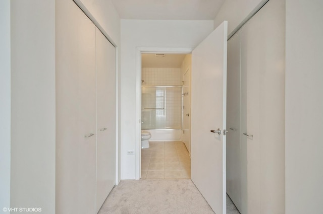 1720 Oak Ave Unit 407, Evanston, IL 60201 - corridor with light tile patterned floors and light colored carpet