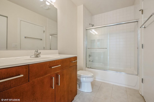 1720 Oak Ave Unit 407, Evanston, IL 60201 - bathroom with vanity, shower / bath combination with glass door, and tile patterned floors