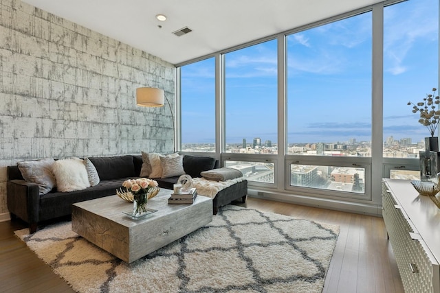 500 W Superior St Unit 1504, Chicago, IL 60654 - living room featuring a city view, wood-type flooring, and expansive windows