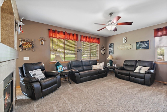 244 Prescott Ave, Elgin, IL 60124 - living room with carpet floors, ceiling fan, and a fireplace
