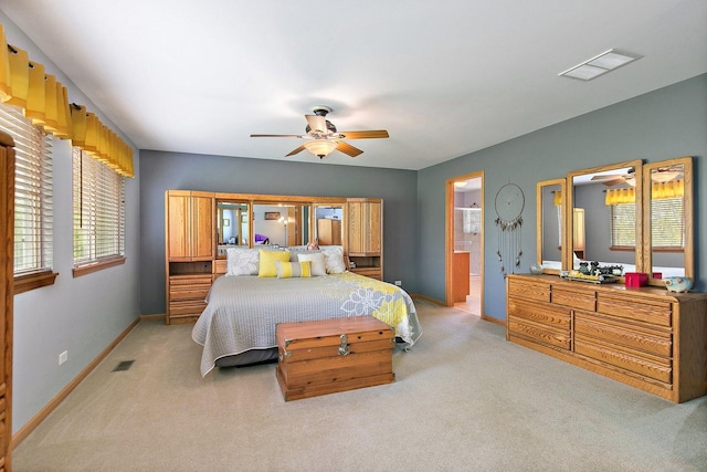 244 Prescott Ave, Elgin, IL 60124 - bedroom featuring light carpet, ensuite bathroom, and a ceiling fan