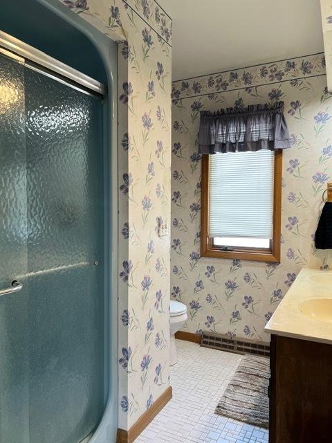 1413 Eustace Dr, Dixon, IL 61021 - full bath featuring wallpapered walls, vanity, and a shower stall