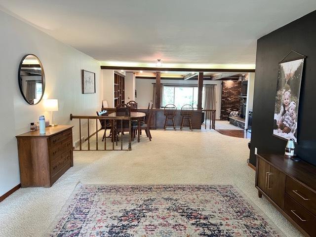 1413 Eustace Dr, Dixon, IL 61021 - dining space featuring light carpet and baseboards