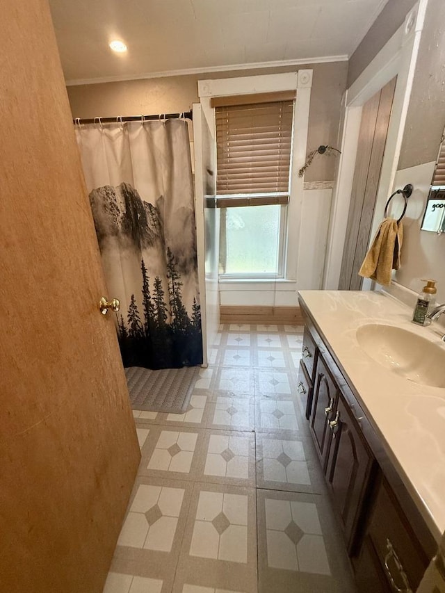 106 E Poplar St, Normal, IL 61761 - bathroom featuring ornamental molding, vanity, a shower with curtain, and tile patterned floors