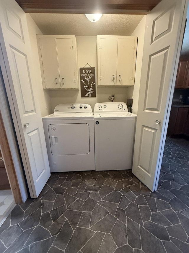 106 E Poplar St, Normal, IL 61761 - laundry area with cabinet space, washing machine and dryer, and a textured ceiling