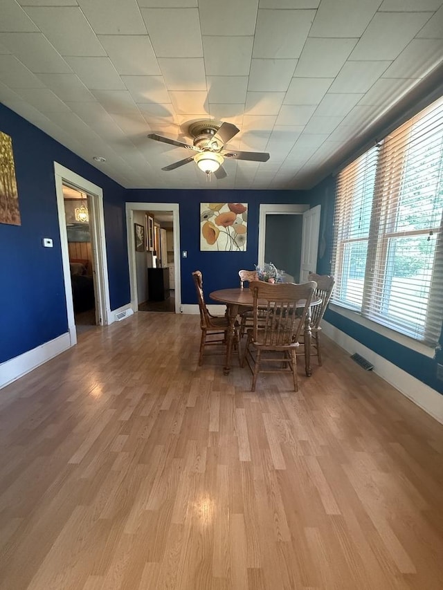 106 E Poplar St, Normal, IL 61761 - dining room featuring ceiling fan and light wood finished floors