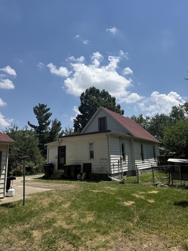 106 E Poplar St, Normal, IL 61761 - view of side of property featuring a lawn