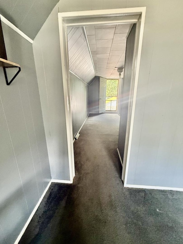 106 E Poplar St, Normal, IL 61761 - corridor featuring vaulted ceiling and carpet flooring