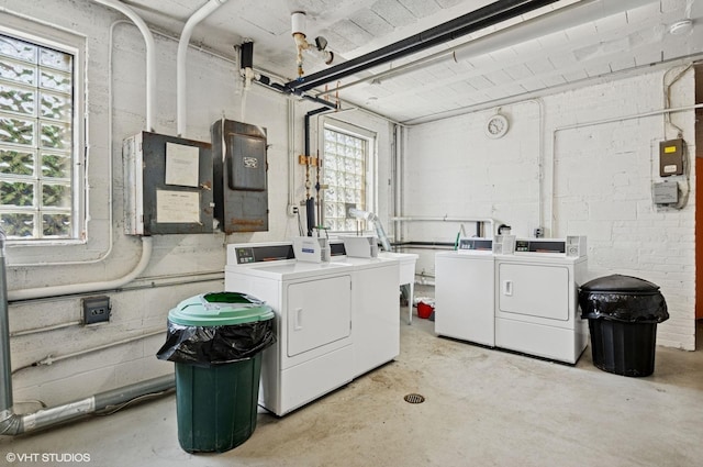 2427 W Farragut Ave Unit 1A, Chicago, IL 60625 - community laundry with washing machine and dryer, plenty of natural light, and electric panel