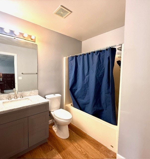 5302 Foxwood Ct, Plainfield, IL 60586 - full bath with wood finished floors, vanity, and shower / tub combo