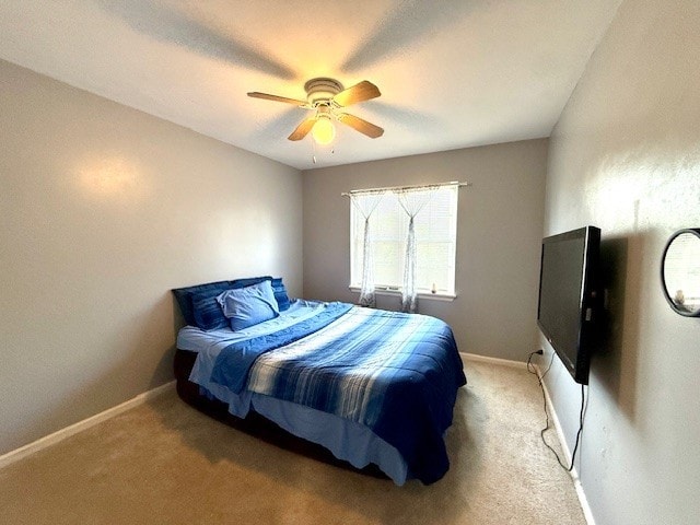 5302 Foxwood Ct, Plainfield, IL 60586 - carpeted bedroom featuring baseboards and a ceiling fan