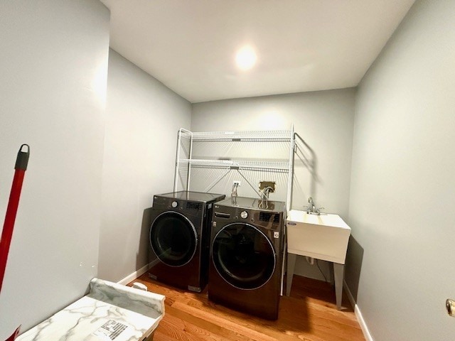 5302 Foxwood Ct, Plainfield, IL 60586 - laundry area featuring washing machine and dryer and light wood-style floors