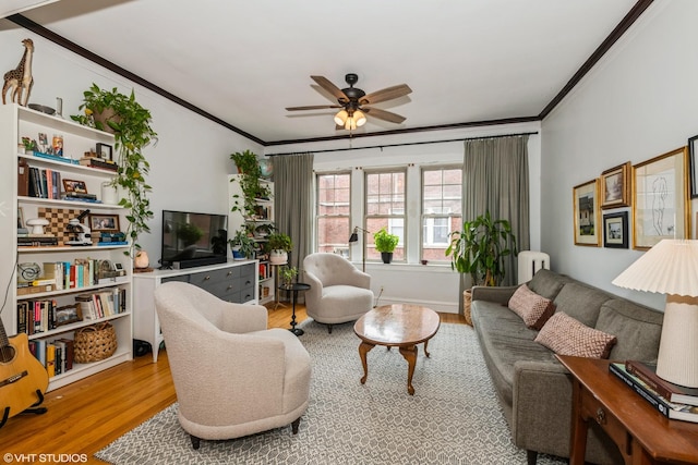 242 S Maple Ave Unit 3W, Oak Park, IL 60302 - living area featuring ornamental molding, ceiling fan, and wood finished floors