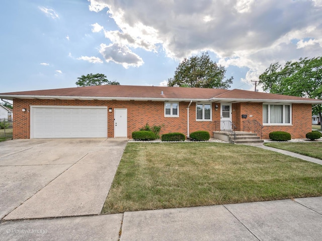 628 W 15th St, Chicago Heights, IL 60411 - ranch-style home with concrete driveway, an attached garage, brick siding, and a front lawn