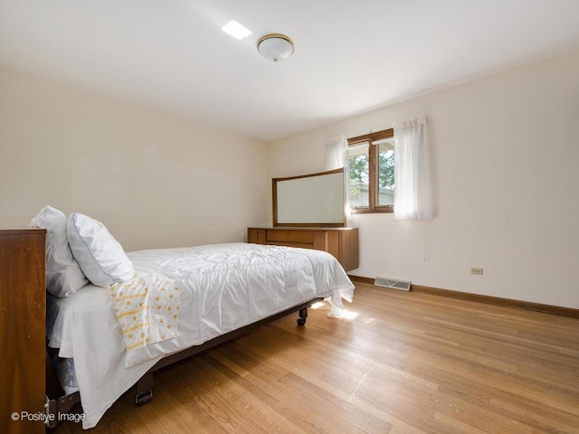628 W 15th St, Chicago Heights, IL 60411 - bedroom with wood finished floors and baseboards