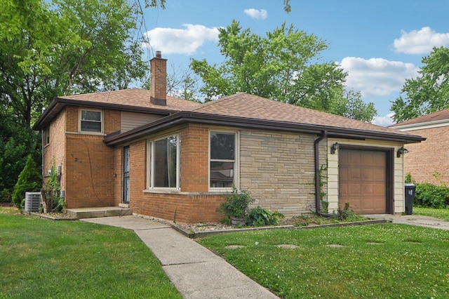924 E 159th Pl, South Holland, IL 60473 - view of front of property with a chimney, an attached garage, a front yard, and brick siding