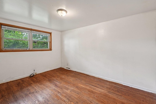 924 E 159th Pl, South Holland, IL 60473 - empty room featuring wood finished floors and baseboards