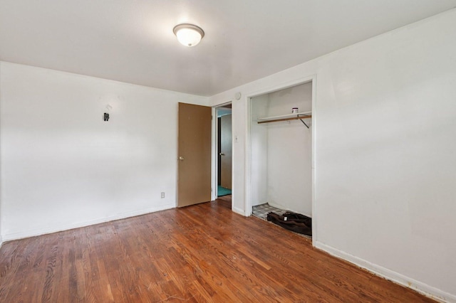 924 E 159th Pl, South Holland, IL 60473 - unfurnished bedroom with wood finished floors and a closet