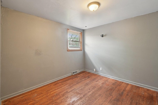 924 E 159th Pl, South Holland, IL 60473 - unfurnished room with wood finished floors and baseboards