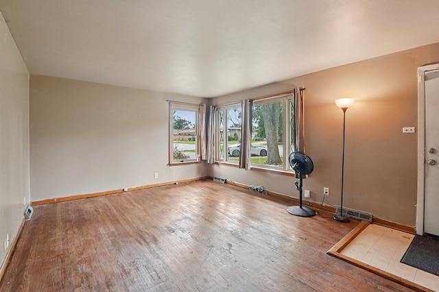 924 E 159th Pl, South Holland, IL 60473 - unfurnished room with wood finished floors and baseboards