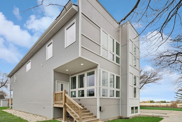1537 Scoville Ave, Berwyn, IL 60402 - back of house with stucco siding and a lawn