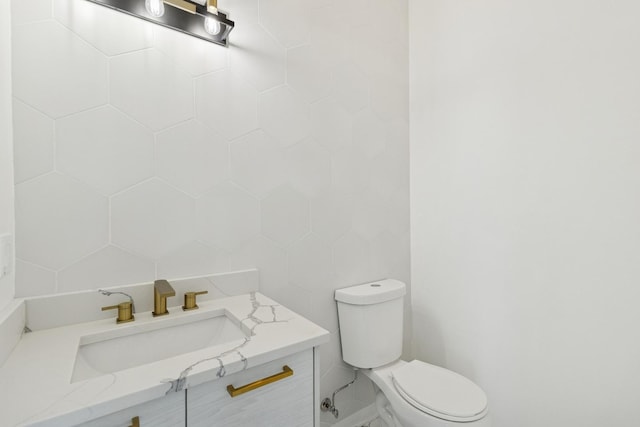 1537 Scoville Ave, Berwyn, IL 60402 - half bathroom featuring toilet and vanity