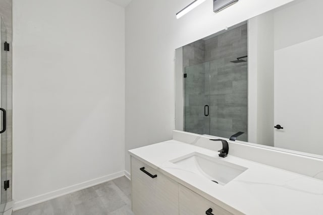 1537 Scoville Ave, Berwyn, IL 60402 - full bath with vanity, a stall shower, and wood finished floors