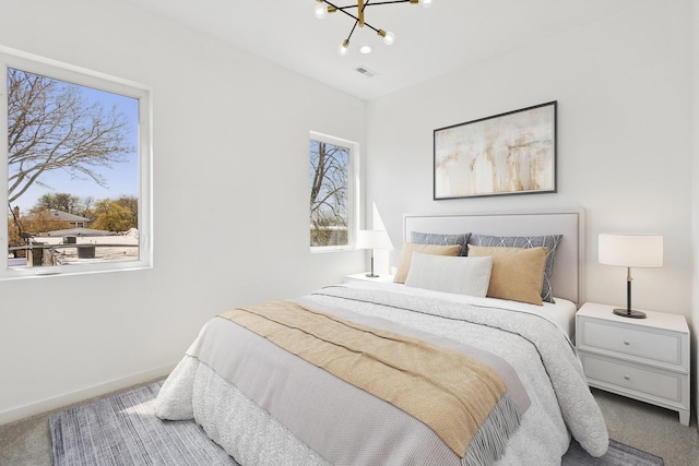 1537 Scoville Ave, Berwyn, IL 60402 - carpeted bedroom with a chandelier and baseboards