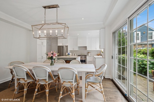 2735 Simpson St, Evanston, IL 60201 - dining area with ornamental molding and wood finished floors