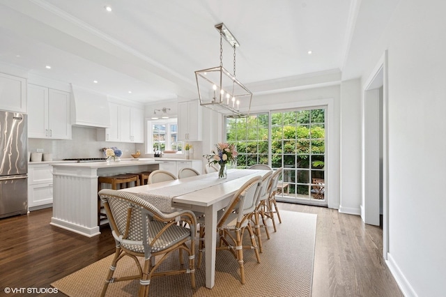 2735 Simpson St, Evanston, IL 60201 - dining area with dark wood-type flooring, recessed lighting, and ornamental molding