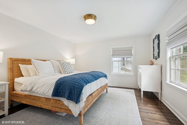 2735 Simpson St, Evanston, IL 60201 - bedroom with dark wood-style flooring and baseboards