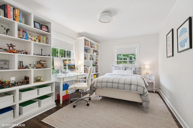 2735 Simpson St, Evanston, IL 60201 - bedroom featuring dark wood-style flooring and an office area