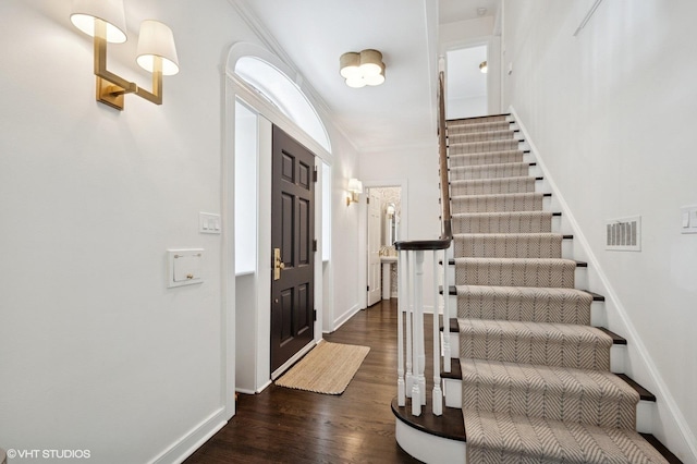 2735 Simpson St, Evanston, IL 60201 - foyer featuring wood finished floors and stairway