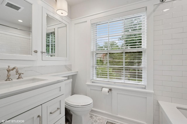 2735 Simpson St, Evanston, IL 60201 - full bathroom featuring vanity, a shower, a tub, and tile patterned flooring