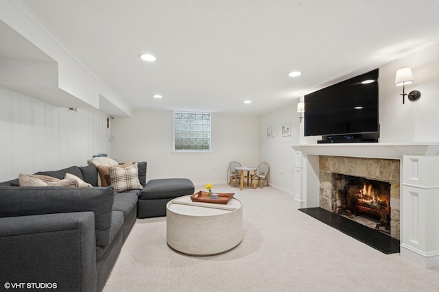 2735 Simpson St, Evanston, IL 60201 - living room with carpet, a fireplace, and recessed lighting