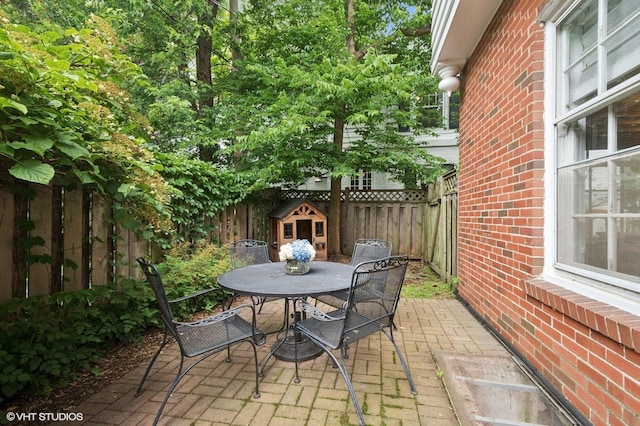 2735 Simpson St, Evanston, IL 60201 - fenced backyard with a patio area and outdoor dining space