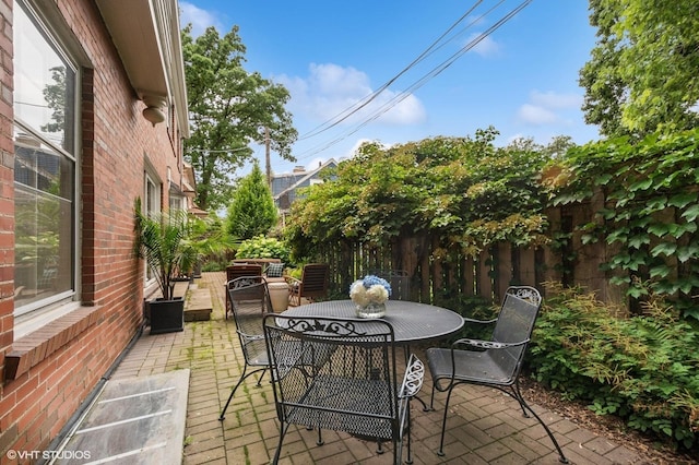 2735 Simpson St, Evanston, IL 60201 - fenced backyard featuring a patio area and outdoor dining space