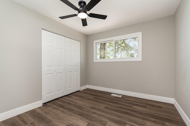 16632 Sawyer Ave, Markham, IL 60428 - unfurnished bedroom featuring dark wood finished floors, a closet, and ceiling fan