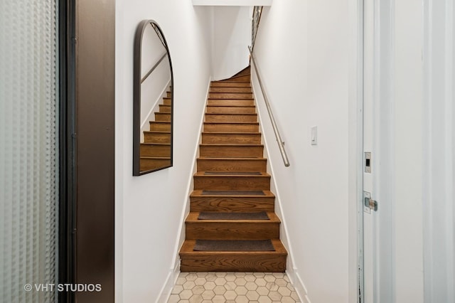 2125 N Mozart St Unit 3, Chicago, IL 60647 - stairway with baseboards and tile patterned floors