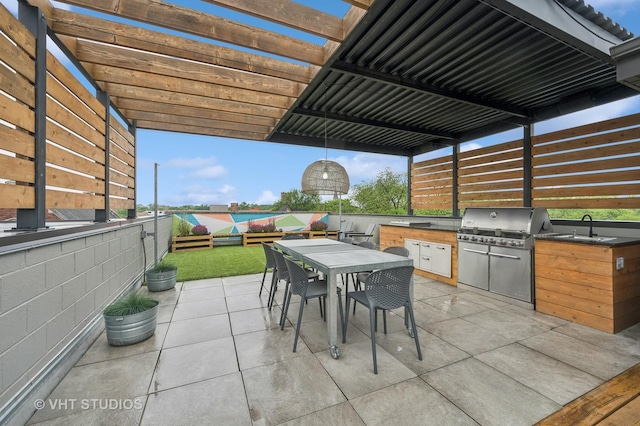 2125 N Mozart St Unit 3, Chicago, IL 60647 - view of patio with an outdoor kitchen, outdoor dining area, and a pergola