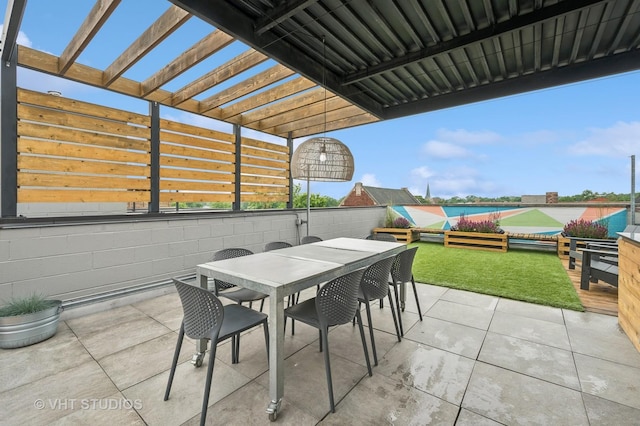 2125 N Mozart St Unit 3, Chicago, IL 60647 - view of patio featuring outdoor dining space and a pergola