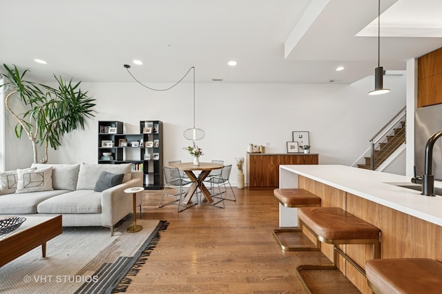 2125 N Mozart St Unit 3, Chicago, IL 60647 - living area featuring wood finished floors, stairway, and recessed lighting